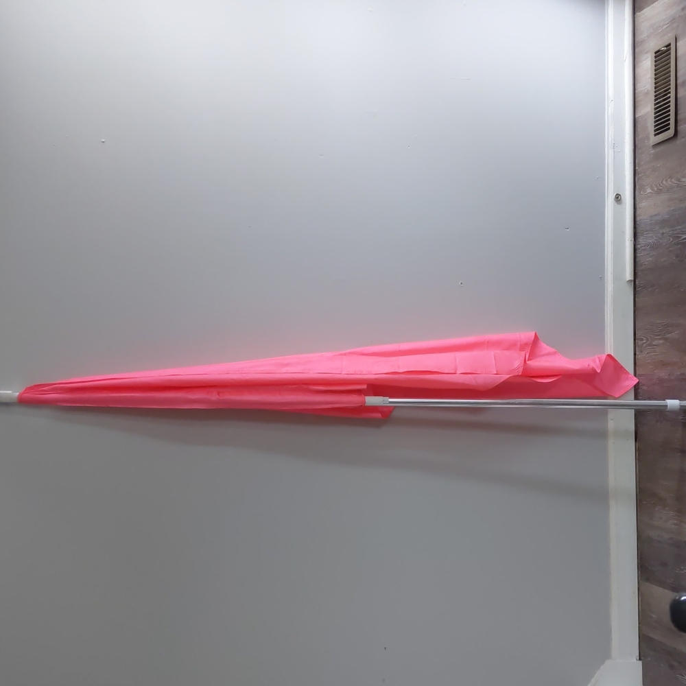 A color guard flag and pole